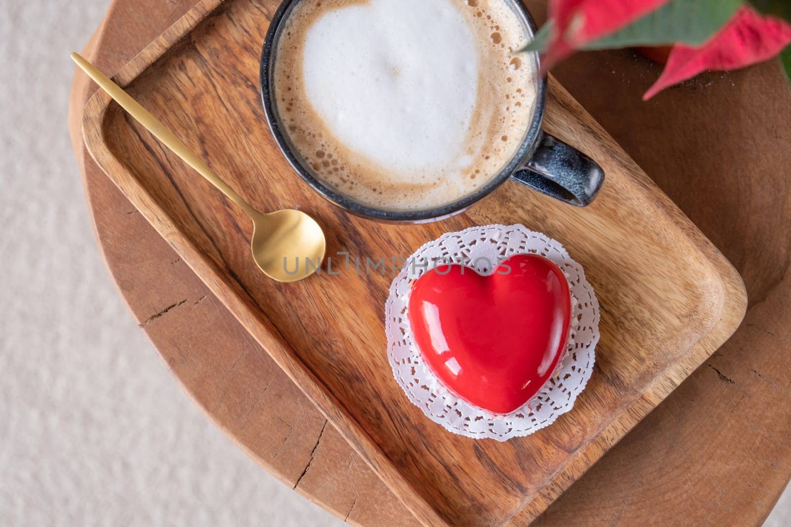 heart shaped glazed valentine cake on wooden tray by Desperada