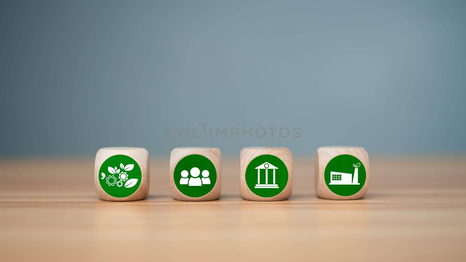 ESG concept of environmental, social and governance, wood block and icon on wooden background It is an idea for sustainable organizational development ​account the green environment. by Unimages2527