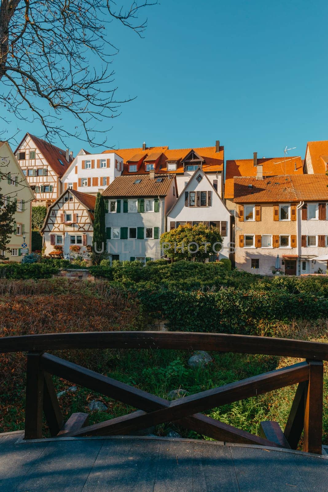 Old national German town house. Old Town is full of colorful and well preserved buildings. Baden-Wurttemberg is a state in southwest Germany bordering France and Switzerland. The Black Forest, known for its evergreen scenery and traditional villages, lies in the mountainous southwest. Stuttgart, the capital, is home to Wilhelma, a royal estate turned zoo and gardens. Porsche and Mercedes-Benz have headquarters and museums there. The 19th-century Hohenzollern Castle sits in the Swabian Alps to the south.