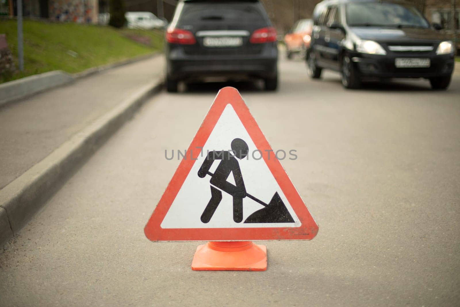 Road sign of road repair. Careful repair. Driver warning. by OlegKopyov