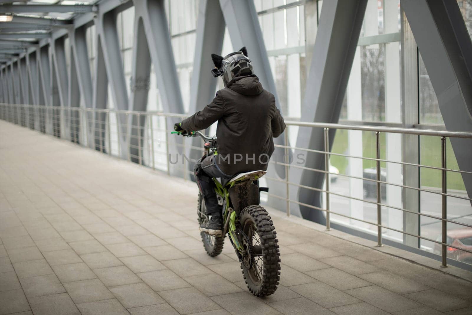 Motorcyclist rides through pedestrian tunnel. Violation of rules of riding bike. Extreme rides. by OlegKopyov