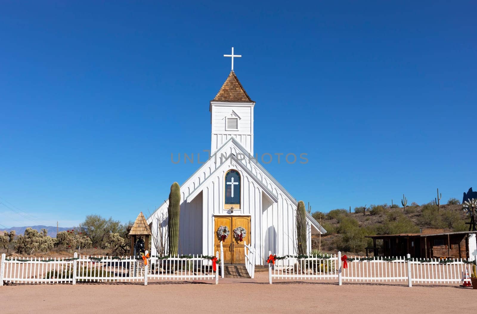 Old Elvis Chapel, Church From Arizona's Mining Days in Superstition Mountains, Near Phoenix, Apache Junction, Ghost Town of Goldfield. Blue Sky, Cactus. Horizontal Plane. High quality photo