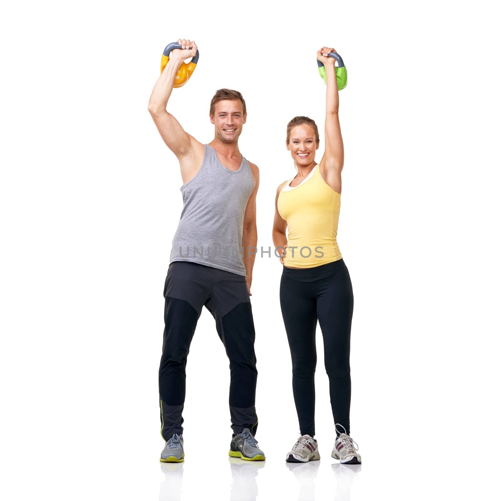 Studio portrait, kettlebell exercise and happy people celebrate muscle growth, strength progress or weightlifting success. Winner, bodybuilding achievement and athlete team goals on white background.