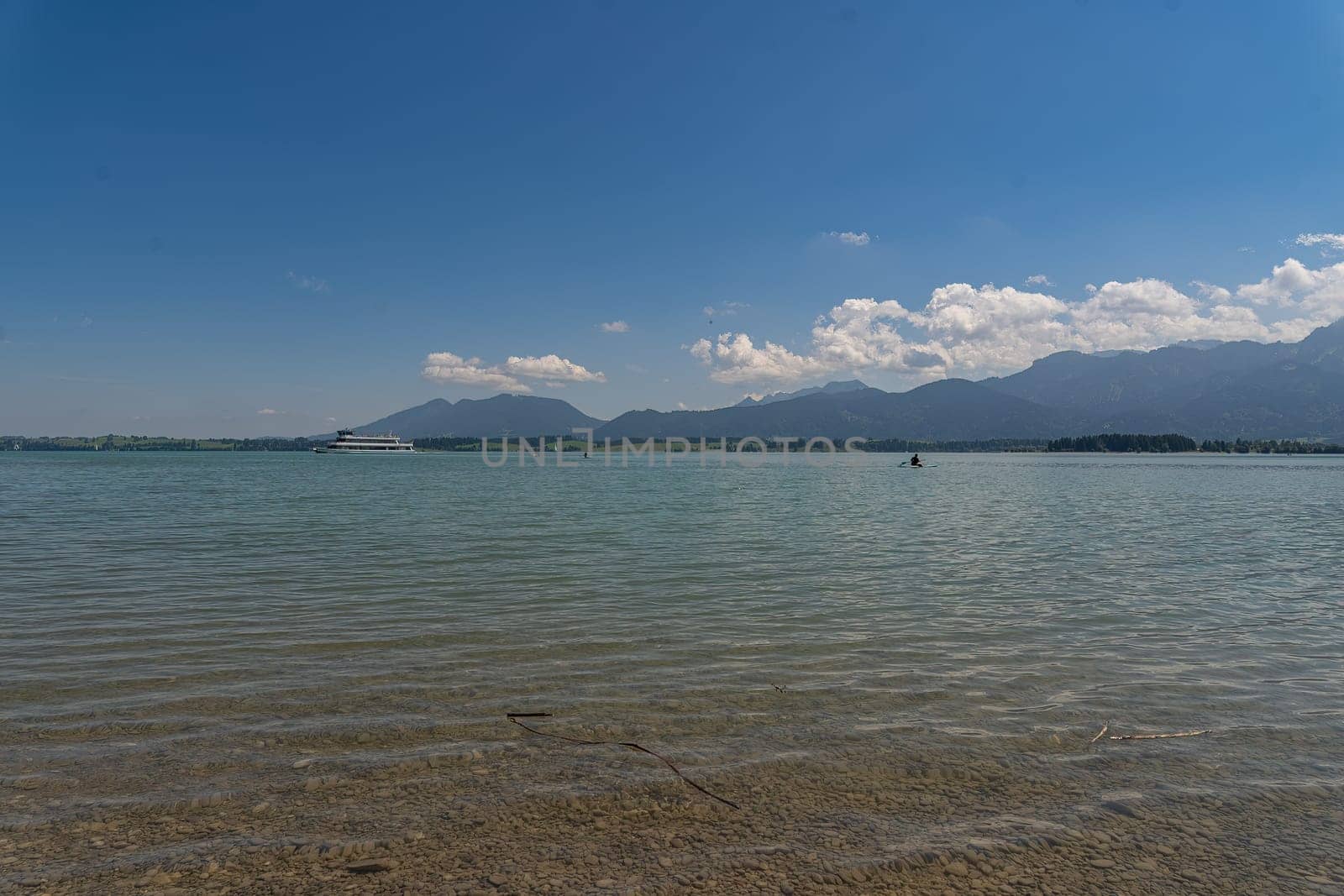 Awesome summer at a turquoise colored lake with clear water