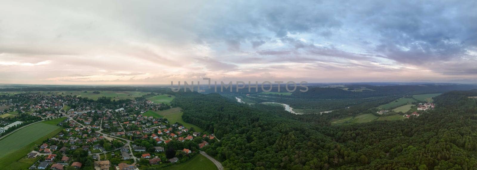 Sunset over the monastery of Schaeftlarn with Isar River View.