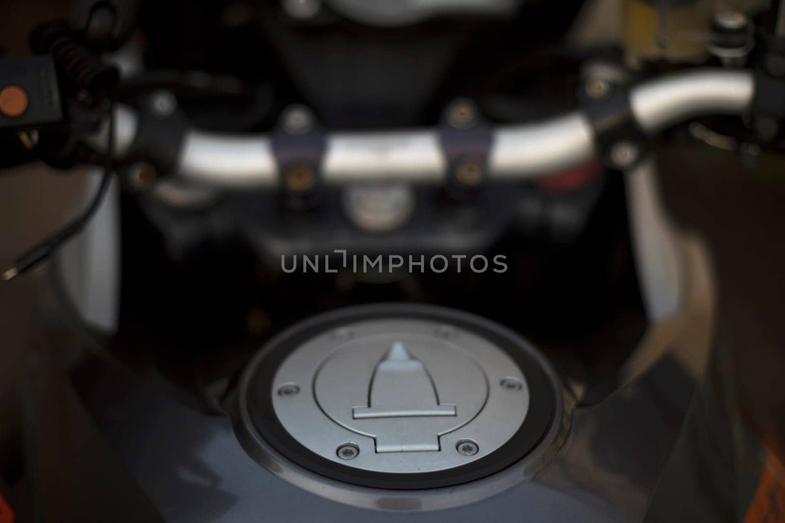Gas tank of motorcycle. Details of bike. Cover on gas tank. by OlegKopyov