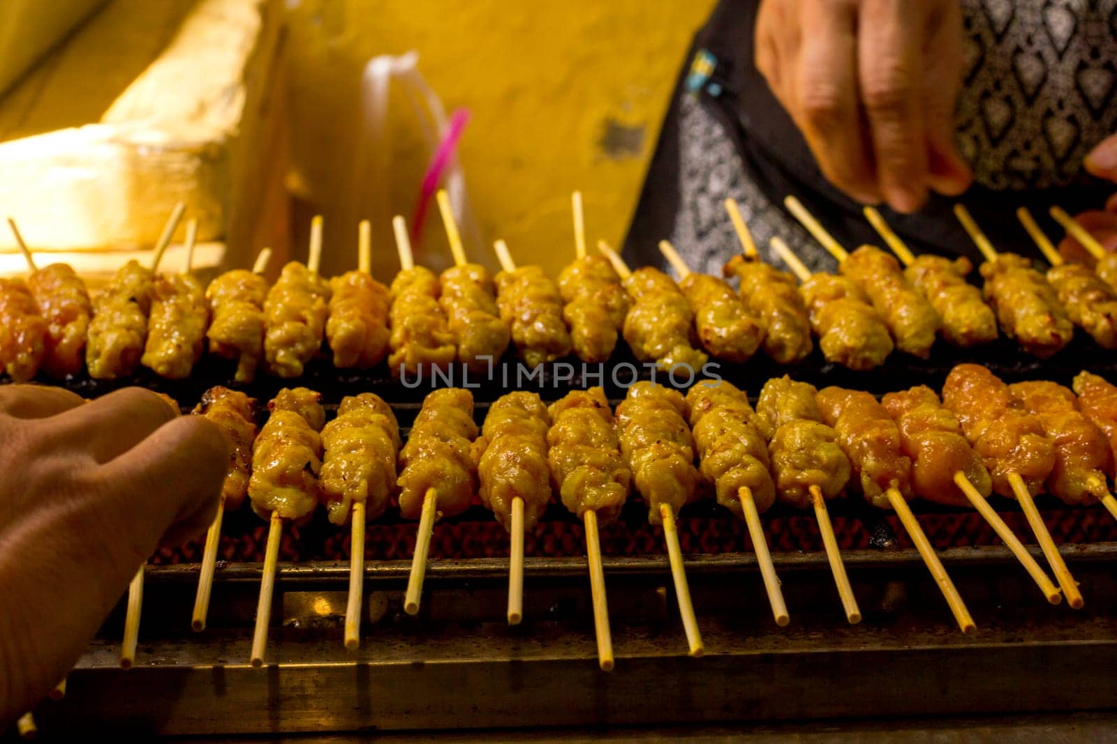 This grilled pork satay is marinated in a creamy peanut butter and soy sauce mixture