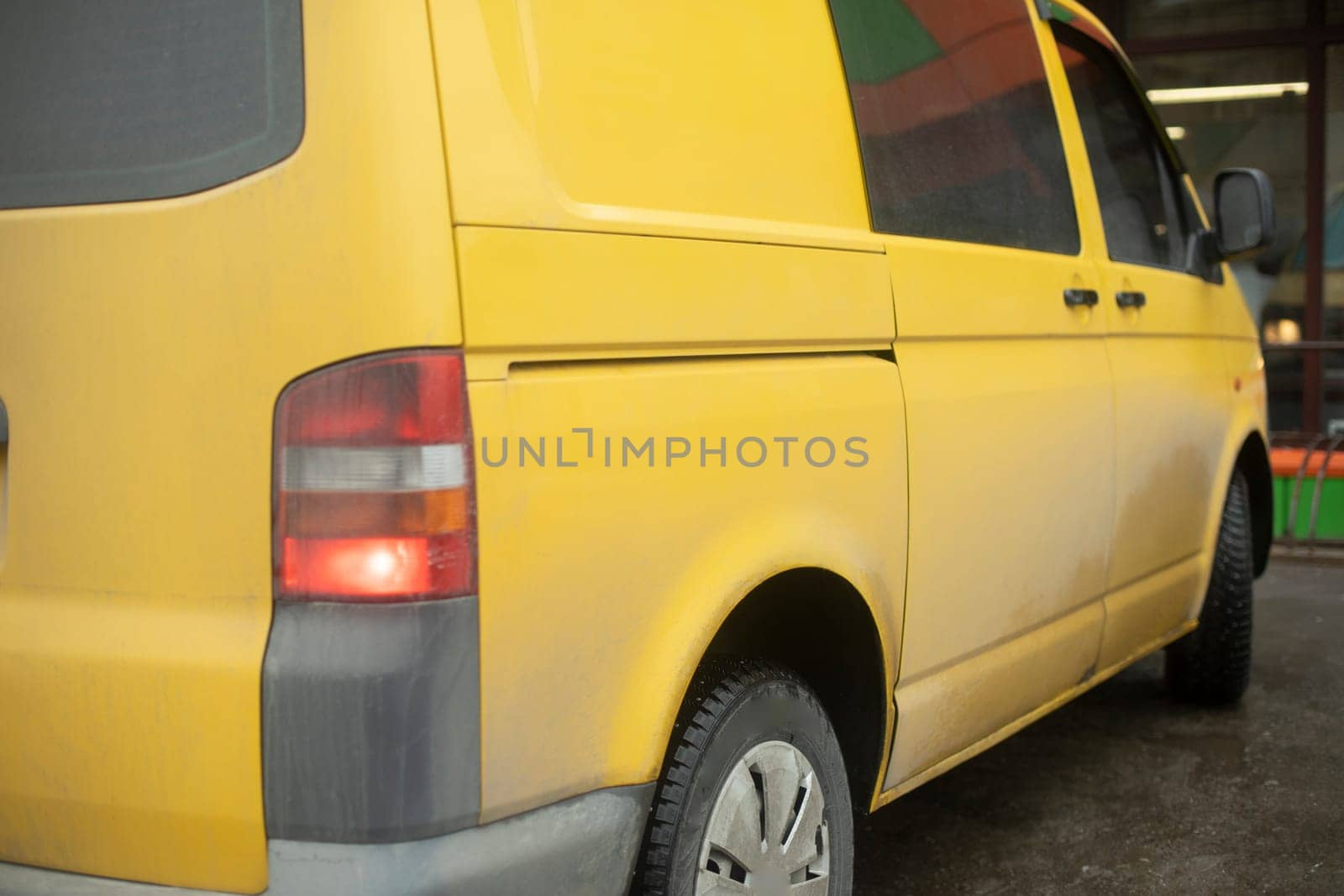 Yellow car in parking lot. Freight transport. by OlegKopyov