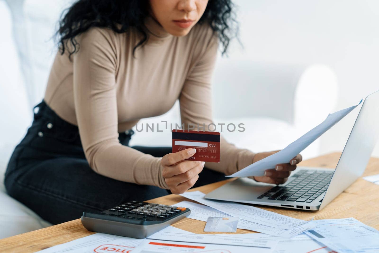 Stressed young woman has financial problems credit card debt to pay crucial by biancoblue