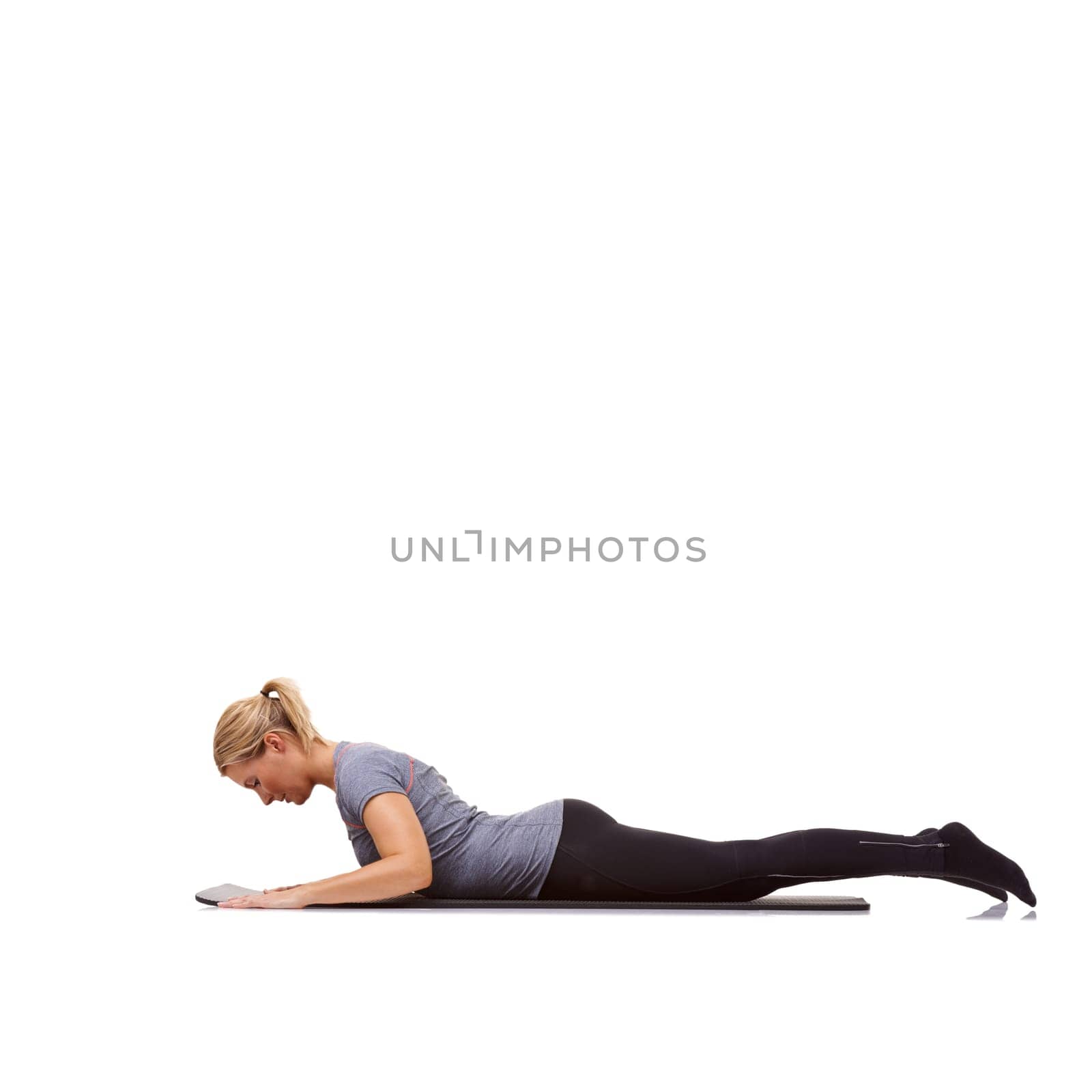 Woman, exercise and mat in studio for cobra, pilates or workout for healthy body, wellness and core muscle. Person, fitness and yoga on floor for abdomen health on mockup space and white background.