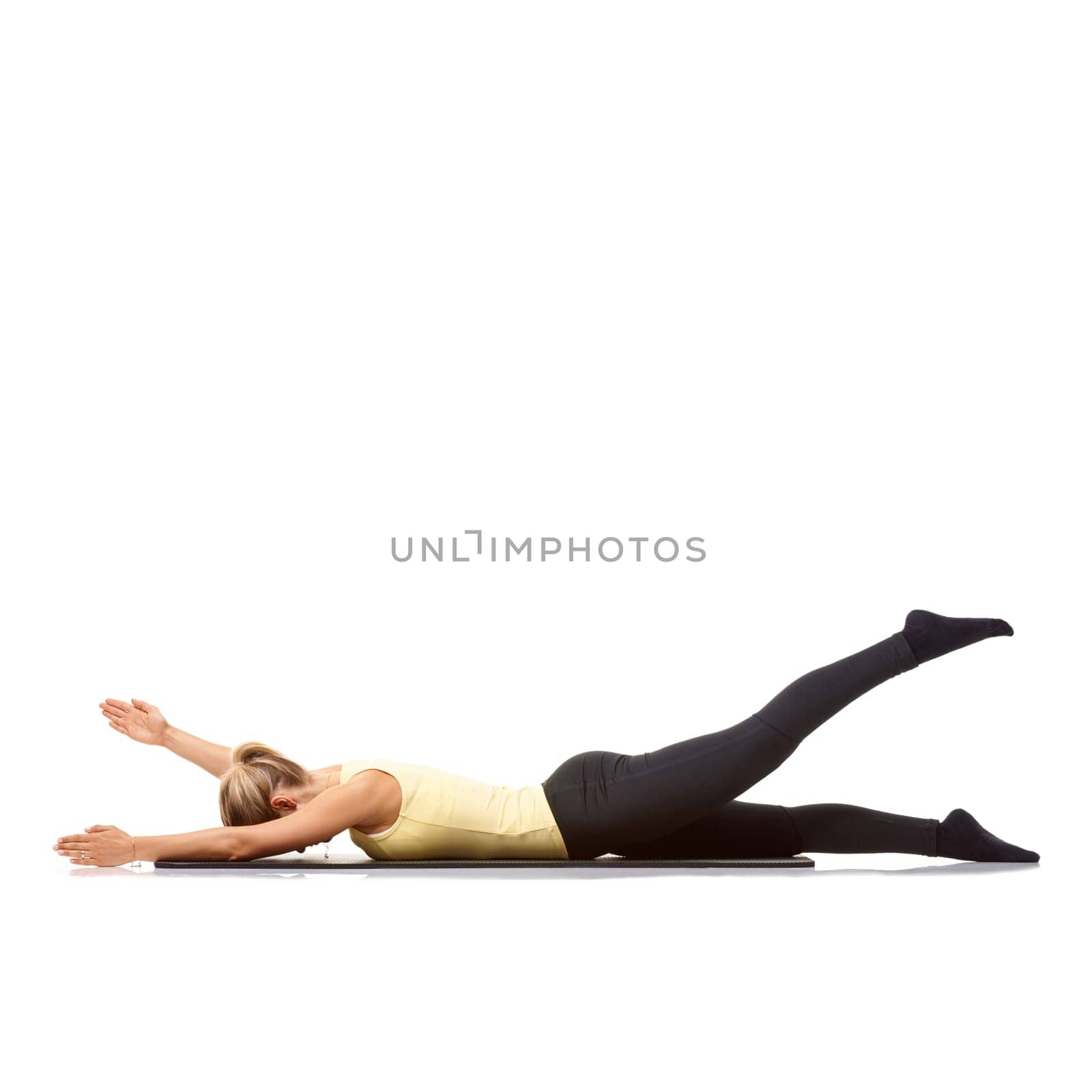 Woman, yoga and mat in studio for stretching, fitness or workout for healthy body, wellness or core muscle. Person, exercise or pilates on floor for abdomen health on mockup space or white background.