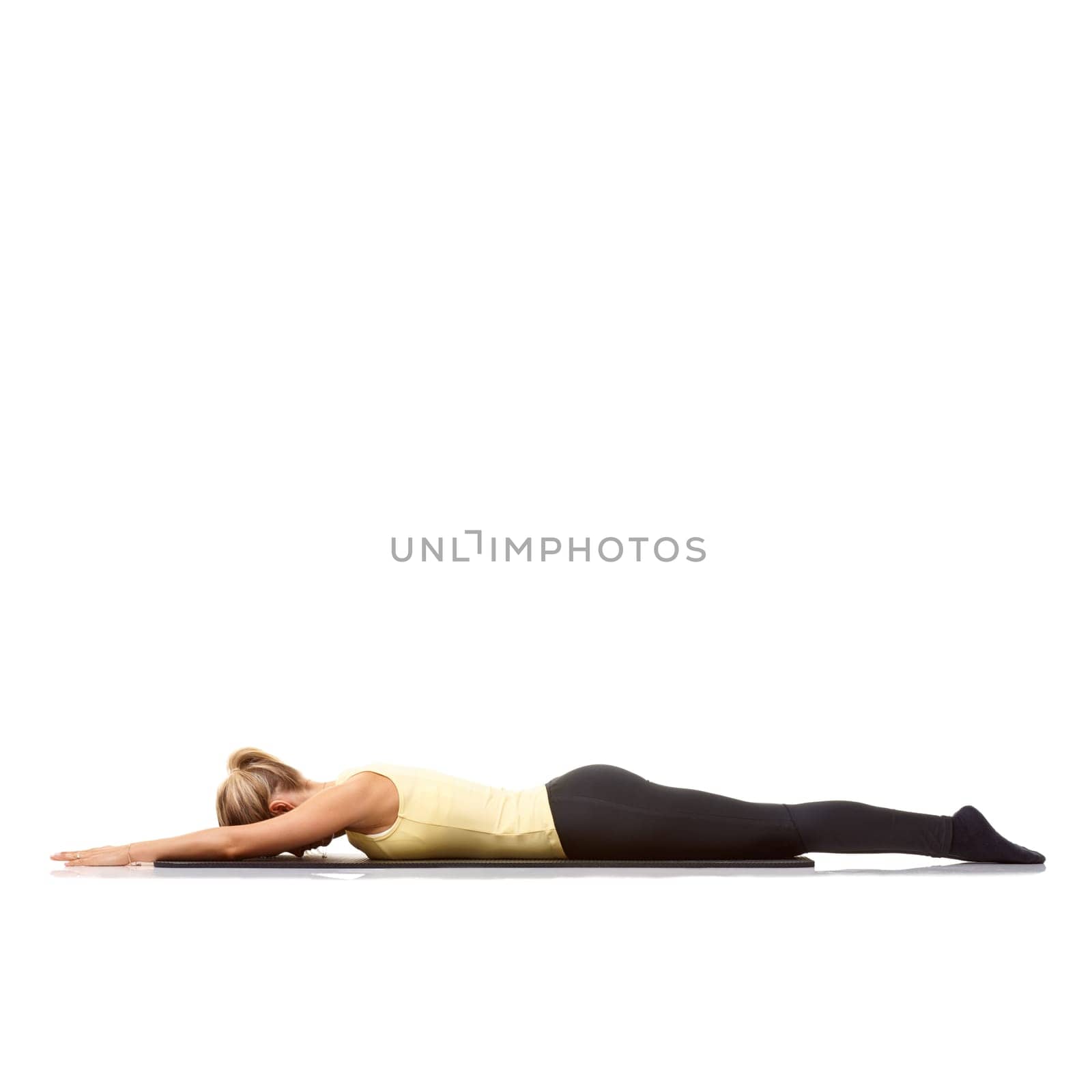 Woman, yoga and mat in studio for stretching, fitness or workout for healthy body, breathing or core muscle. Person, exercise and rest on floor for abdomen health on mockup space or white background.
