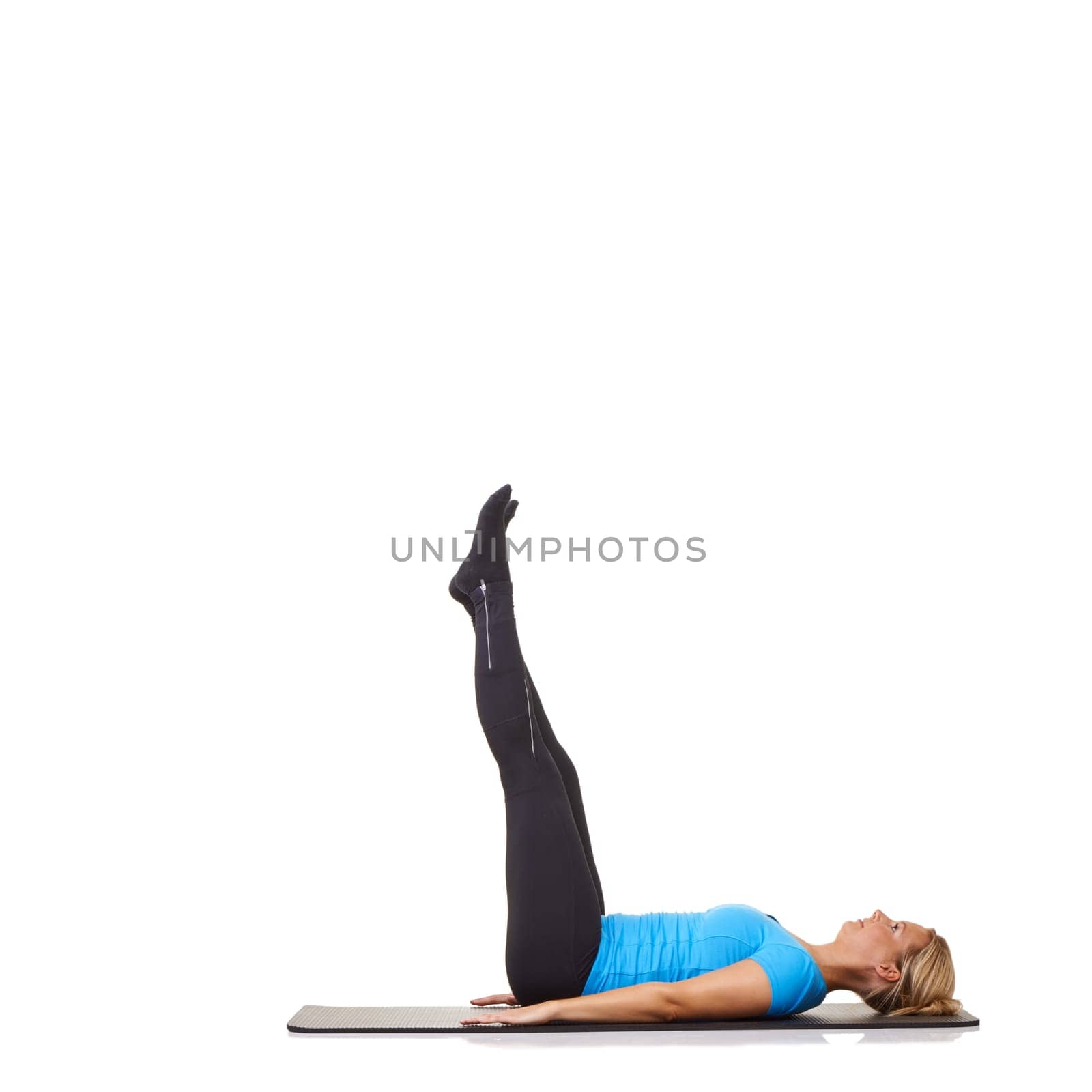 Woman, pilates and mat in studio for stretching leg, fitness or workout for healthy body, wellness and core muscle. Person, exercise and yoga on floor for kegel health on mock up or white background by YuriArcurs