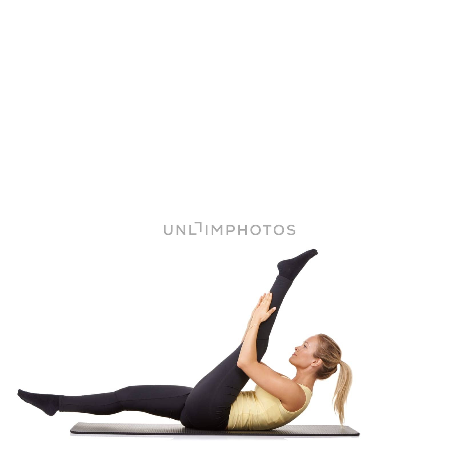 Woman, legs and stretching on yoga mat for gym flexibility, mockup space or white background. Female person, challenge and healthy wellness in studio for progress, splits practice or pilates training by YuriArcurs