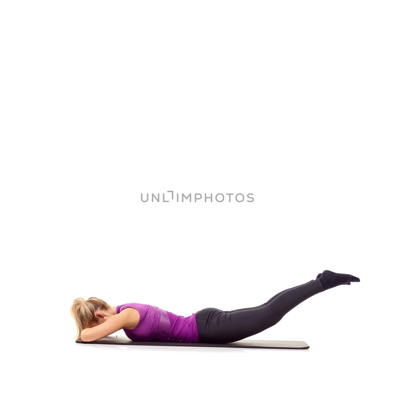 Woman, legs and glutes on yoga mat in studio for pilates performance, mockup space or white background. Female person, stretching and wellness progress exercise for training, challenge or healthy.