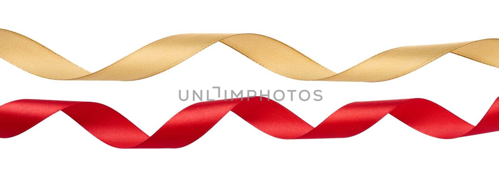 Twisted red and yellow satin ribbon isolated. Decor for gift wrapping