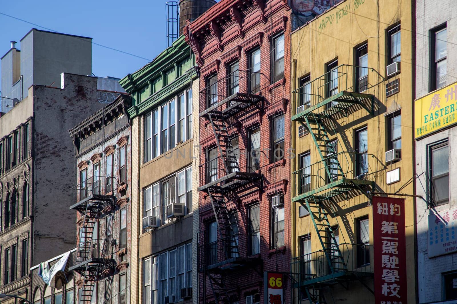 Buildings with Fire Escape in Chinatown, NYC by oliverfoerstner