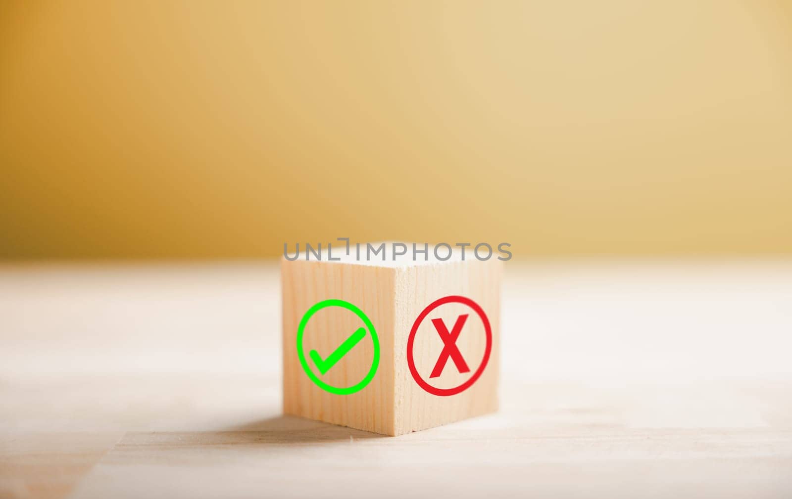Wooden block presents green check mark and red x symbolizing decision making. Choice concept. Think With Yes Or No Choice.