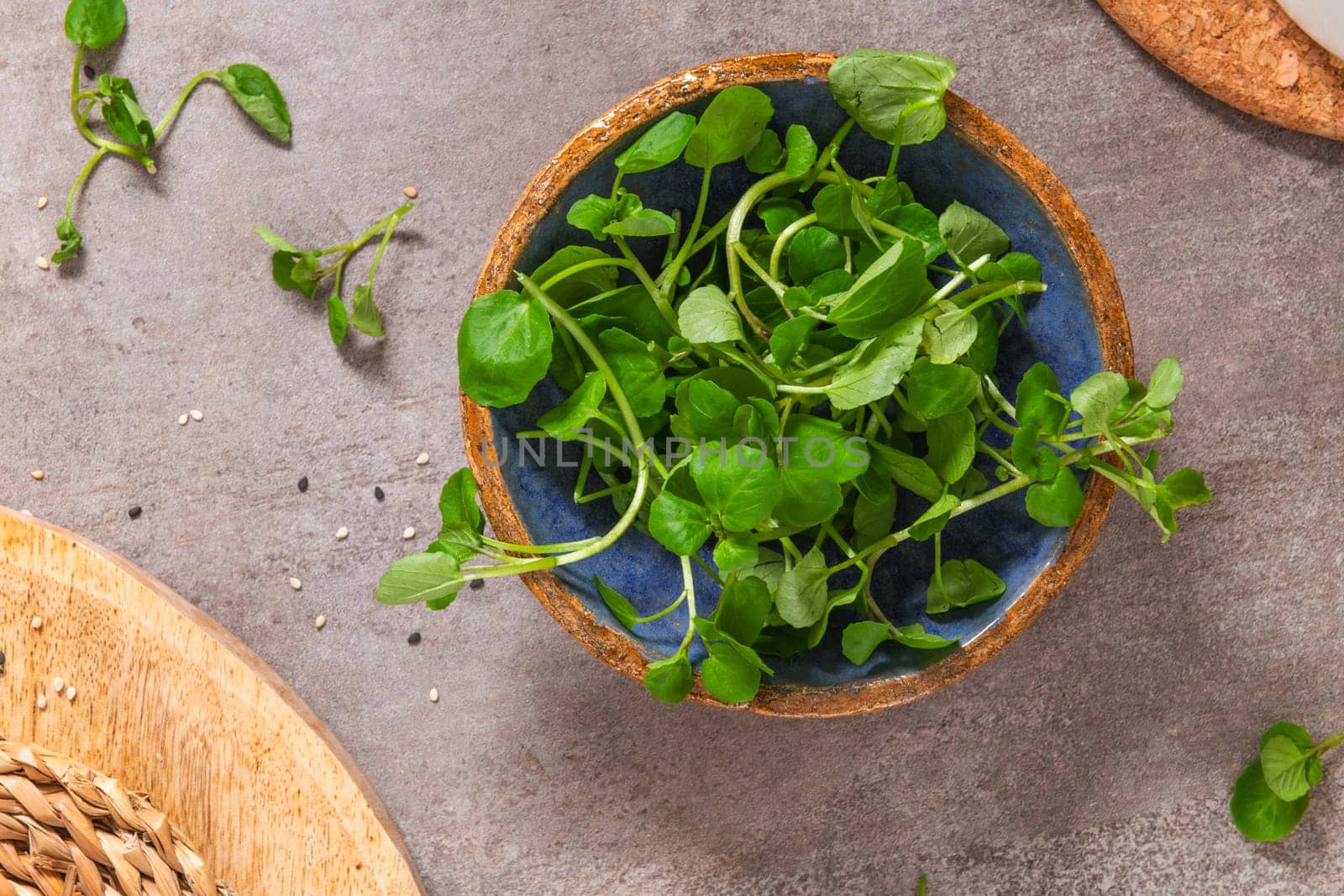 Raw Green Organic Watercress in a Bow, top view.