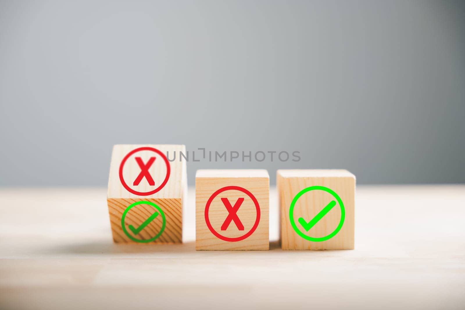 Concepts of business solution and strategy depicted. Wood sphere flips red wrong symbols to green checkmark illustrating change from wrong to right on wooden cubes. Think With Yes Or No Choice.