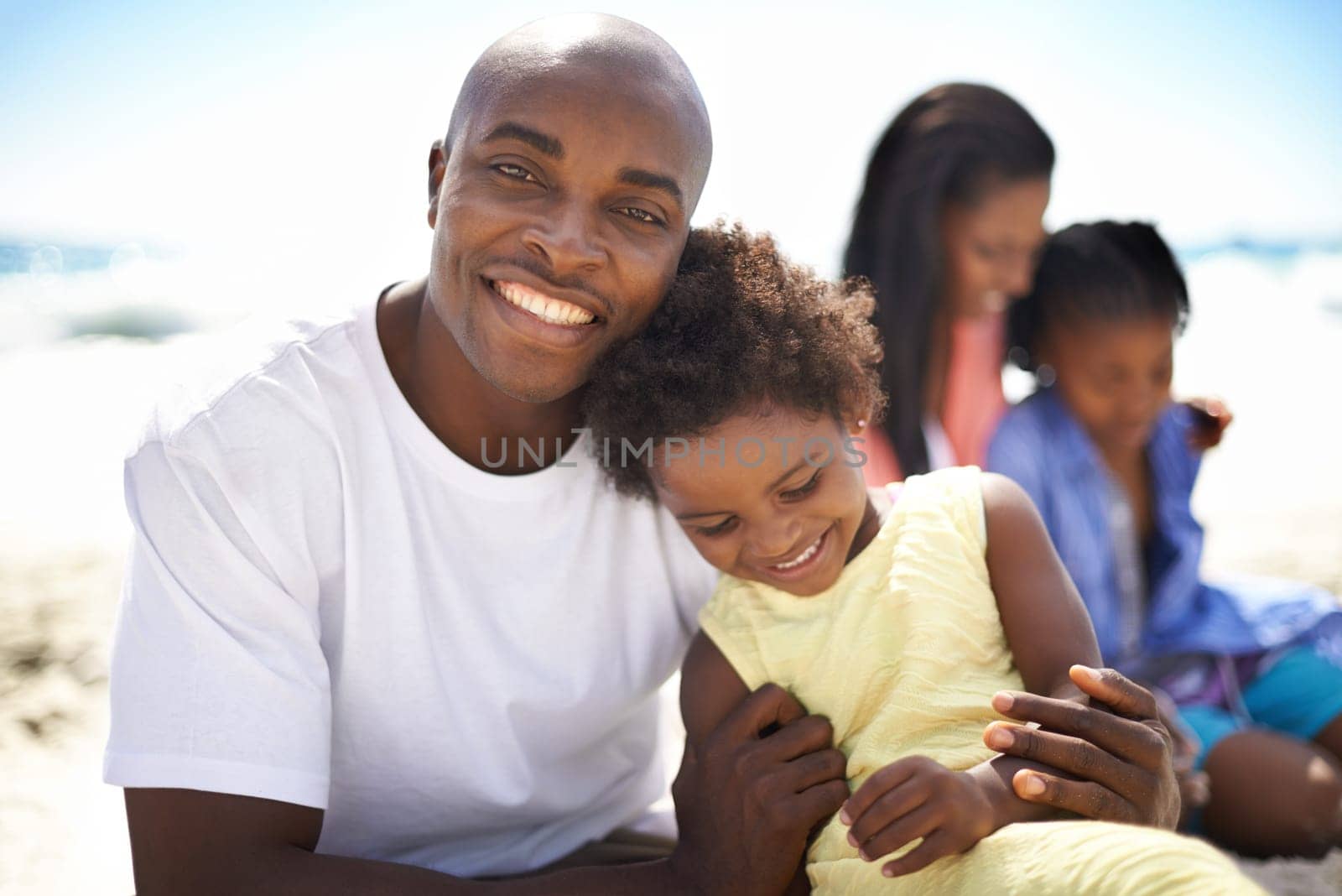 African family, parents or children and hug at beach for adventure, holiday or vacation in summer. Black people, face and smile outdoor in nature for embrace, experience or bonding and relationship.