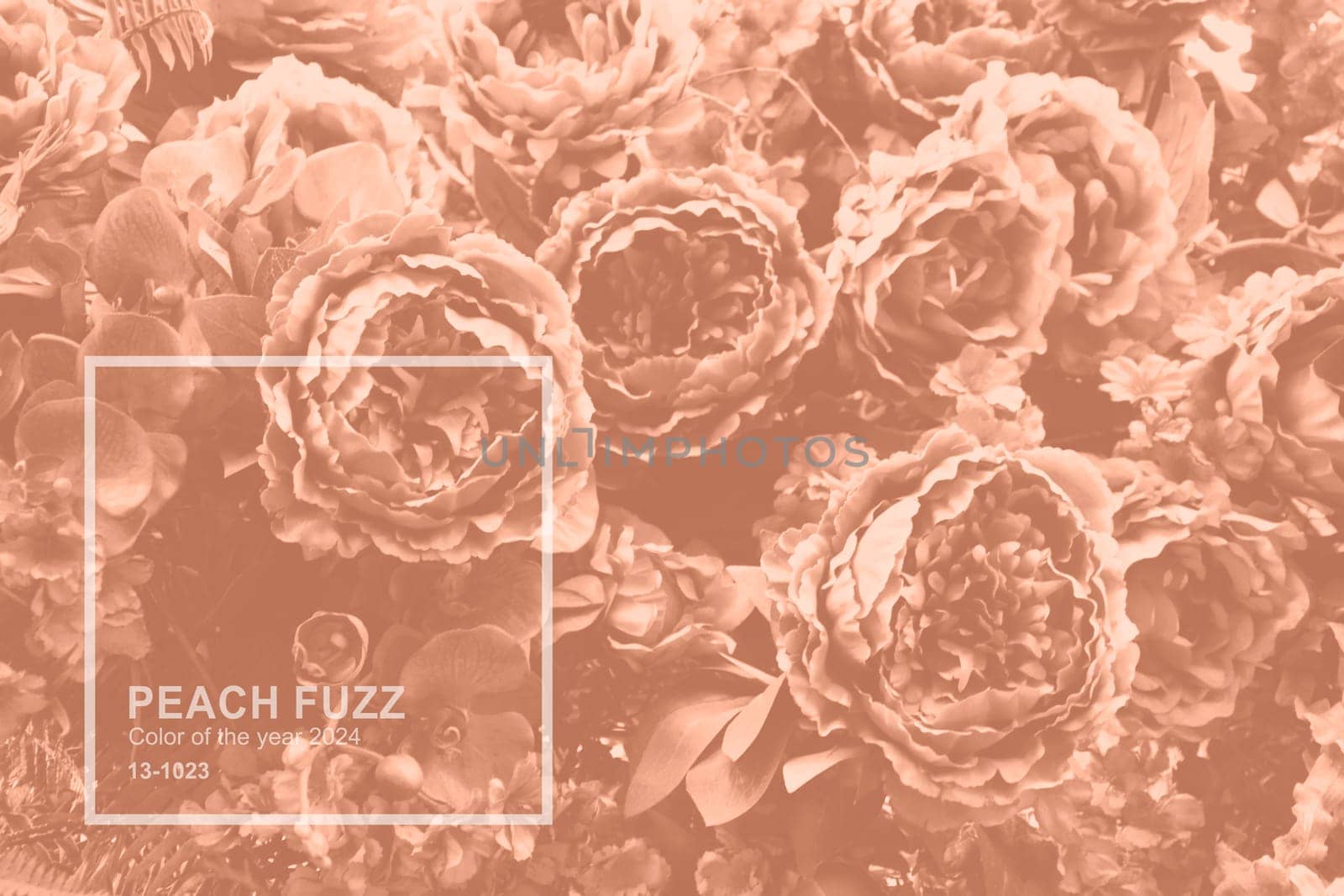 Handmade fabric flower close up Peach Fuzz color. Monochrome background with fabric craft flower. Trendy colour 2024. High quality photo