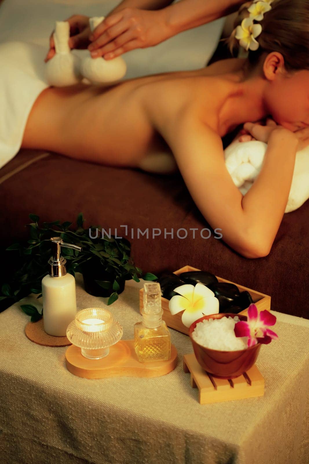 Hot herbal ball spa massage body treatment. Quiescent by biancoblue