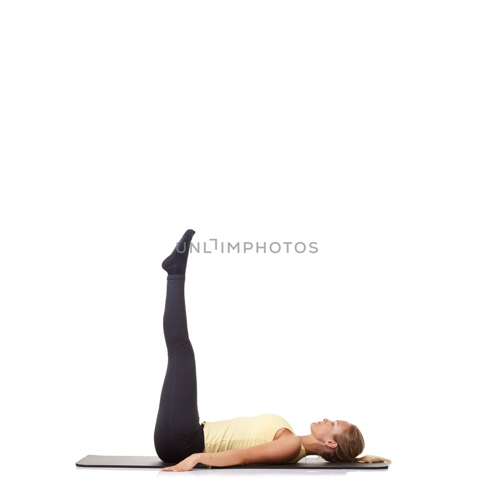 Woman, pilates and mat in studio for stretching legs, fitness or workout for healthy body, wellness or core muscle. Person, exercise and yoga on floor for abdomen on mockup space and white background.