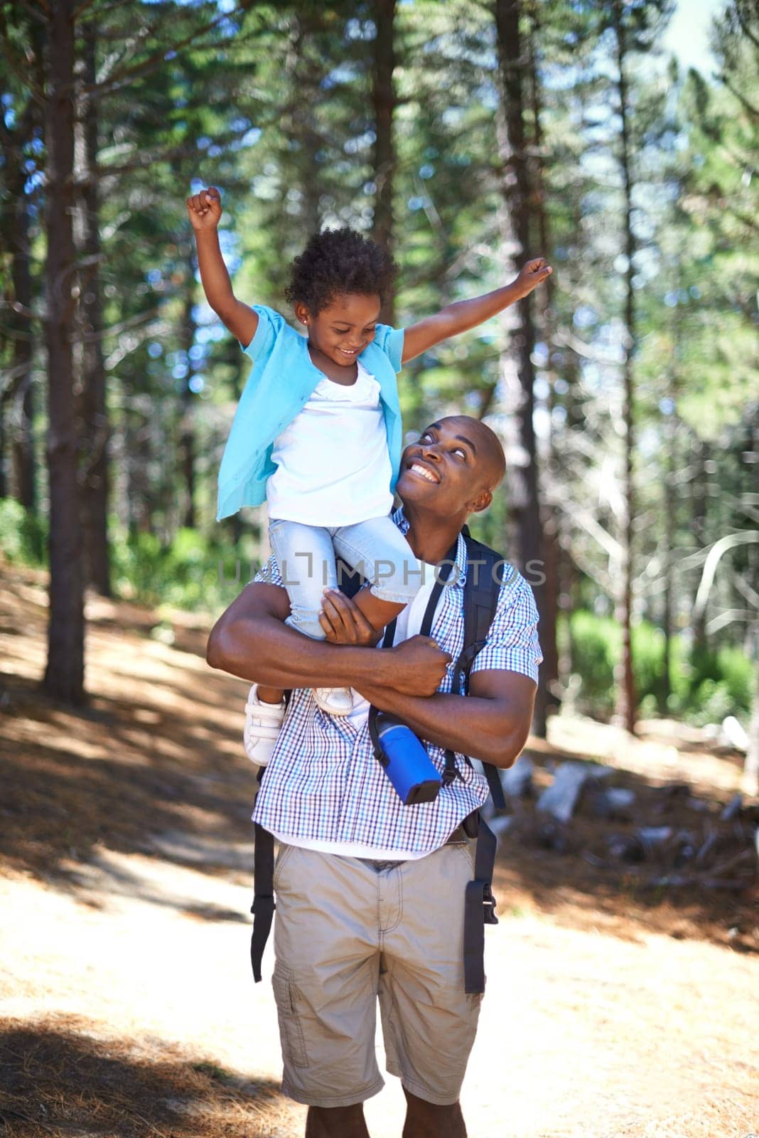 Father, child and forest nature for hiking park path on weekend for trees explore, journey or vacation. Black person, daughter and celebrate in summer for holiday together, woods travel or sunshine by YuriArcurs