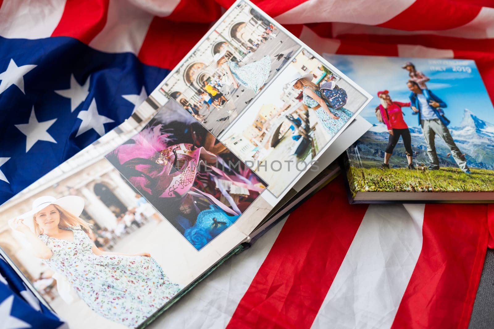 a Photobook of family at home on a background. Photobook is gift. professional photographer and designer. printing of photos and journals in photo laboratory. High quality photo
