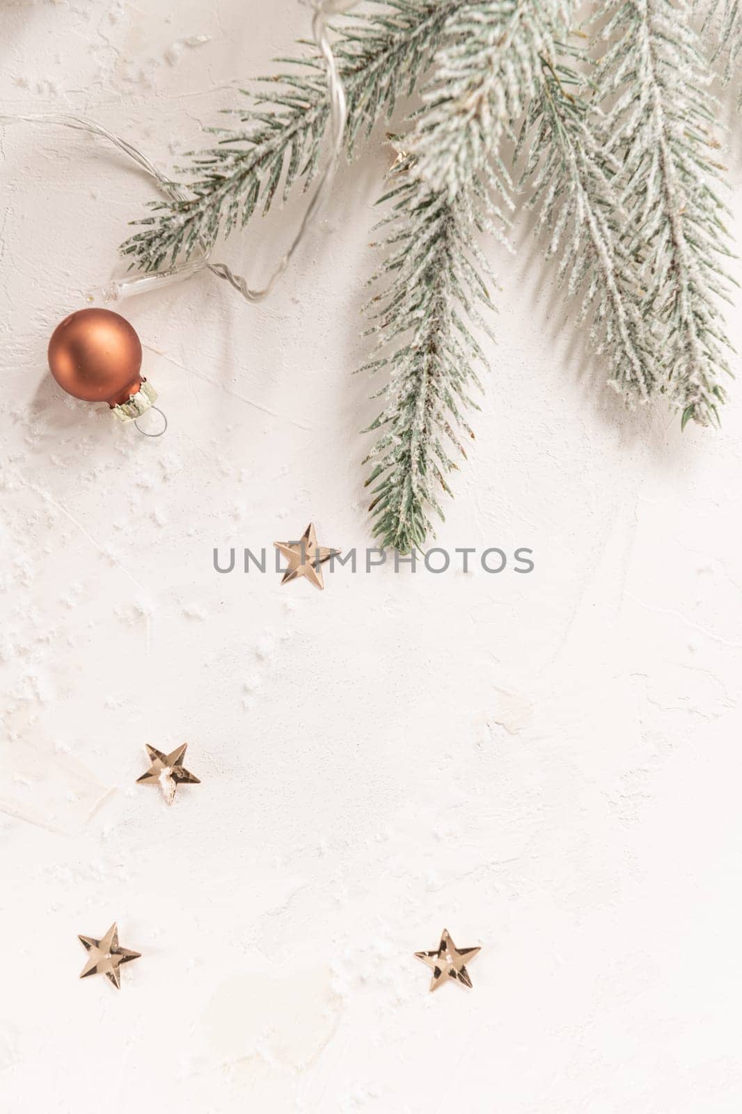 Christmas decorations on white grunge wooden board background.