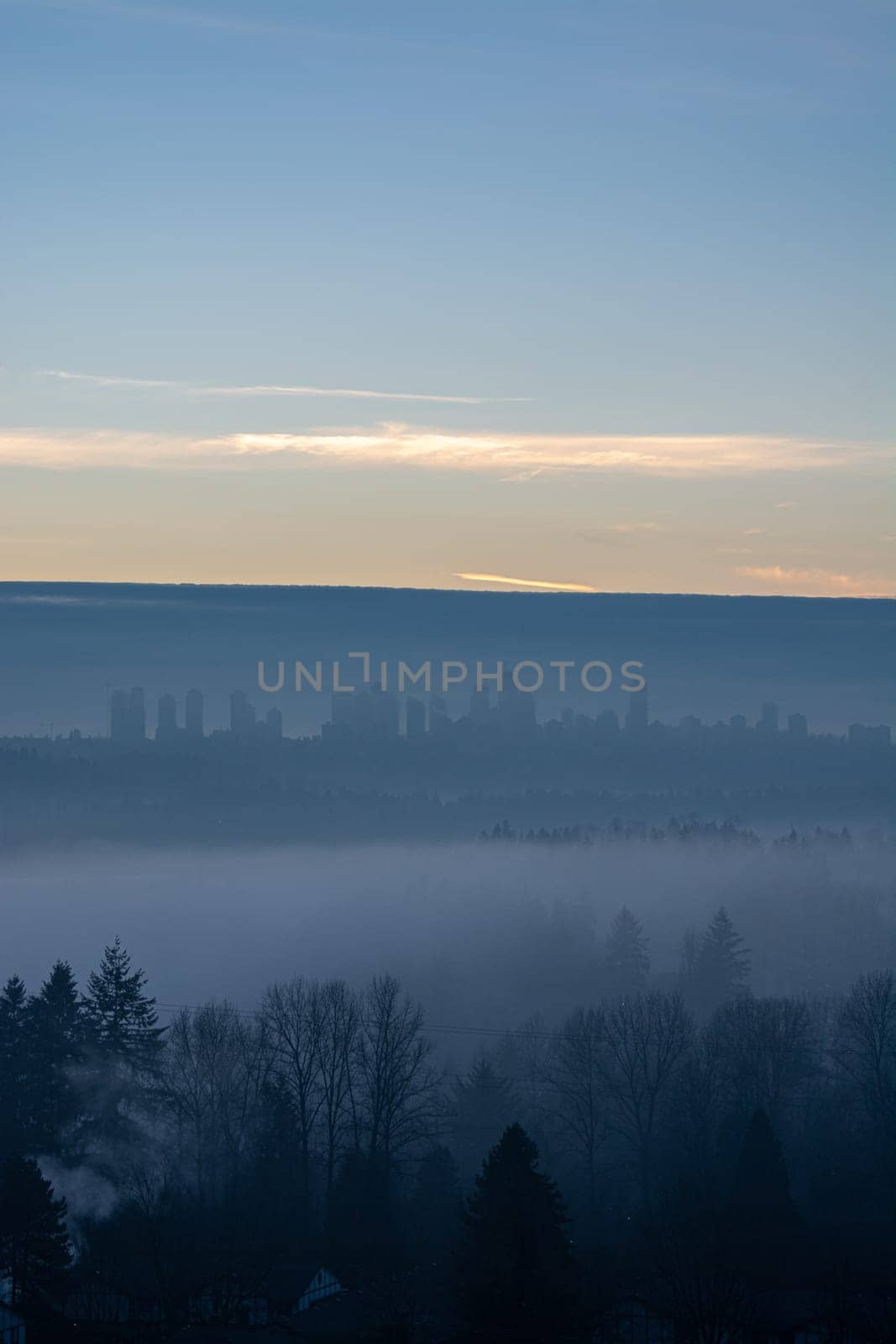 Clear sky background above Metrotown covered with thick fog