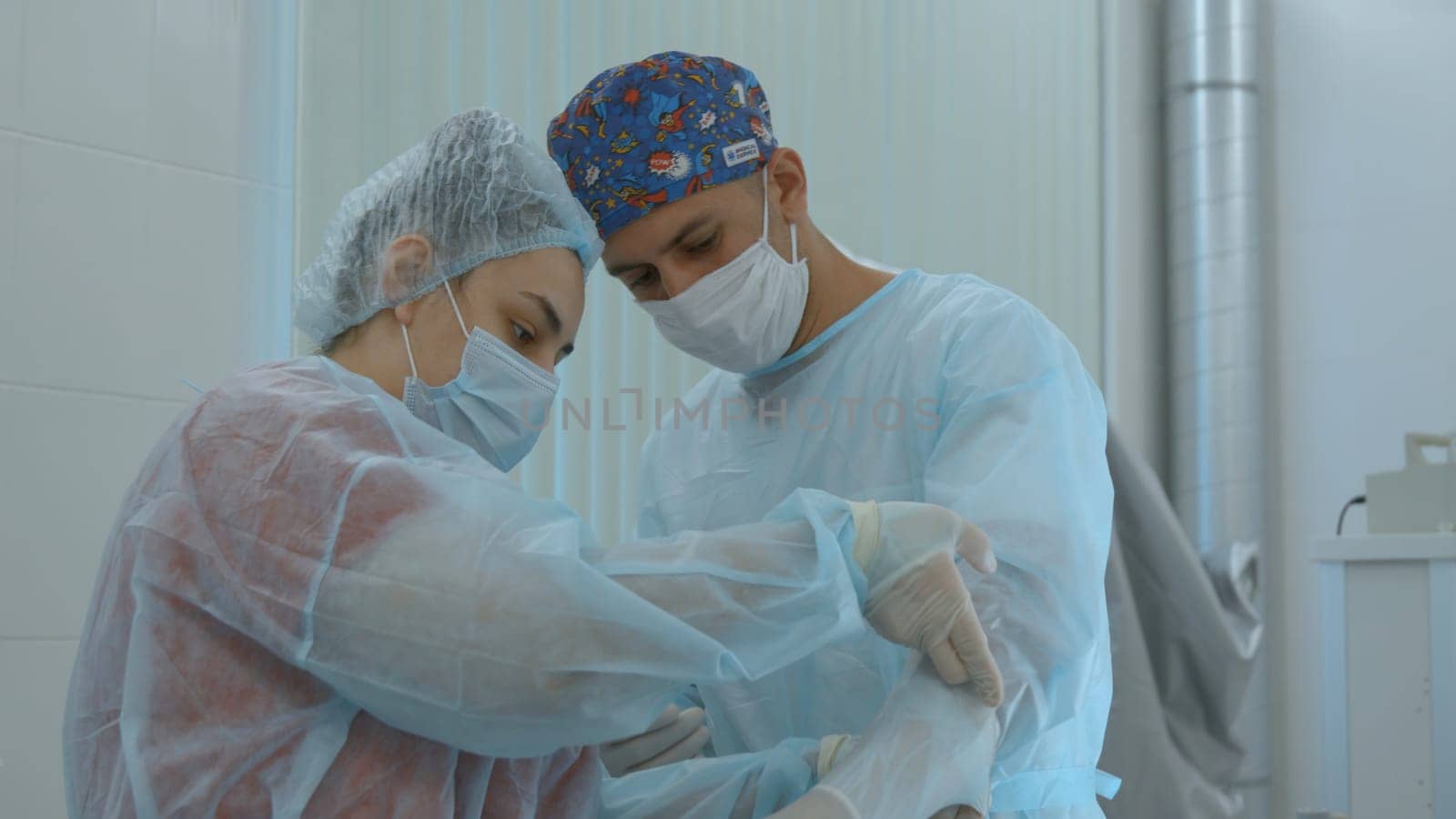 Close up of surgery performed by professional specialists. Action. Concentrated work of a surgeon