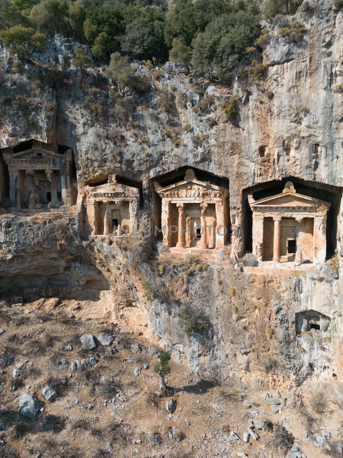 Dalyan, Mugla. Turkey Kings tombs in the cliff face Kaunos Dalyan, Turkey. Aerial view . by senkaya