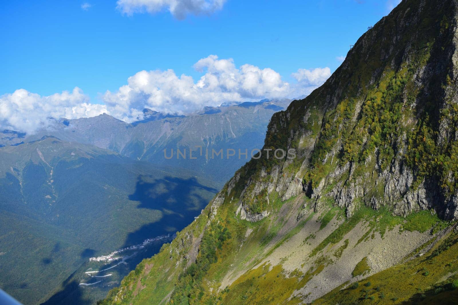 A view of a valley with mountains in the background, a matte painting by Domirinic Fegallia, featured on flickr, new objectivity, creative commons attribution, photo taken with ektachrome, panorama