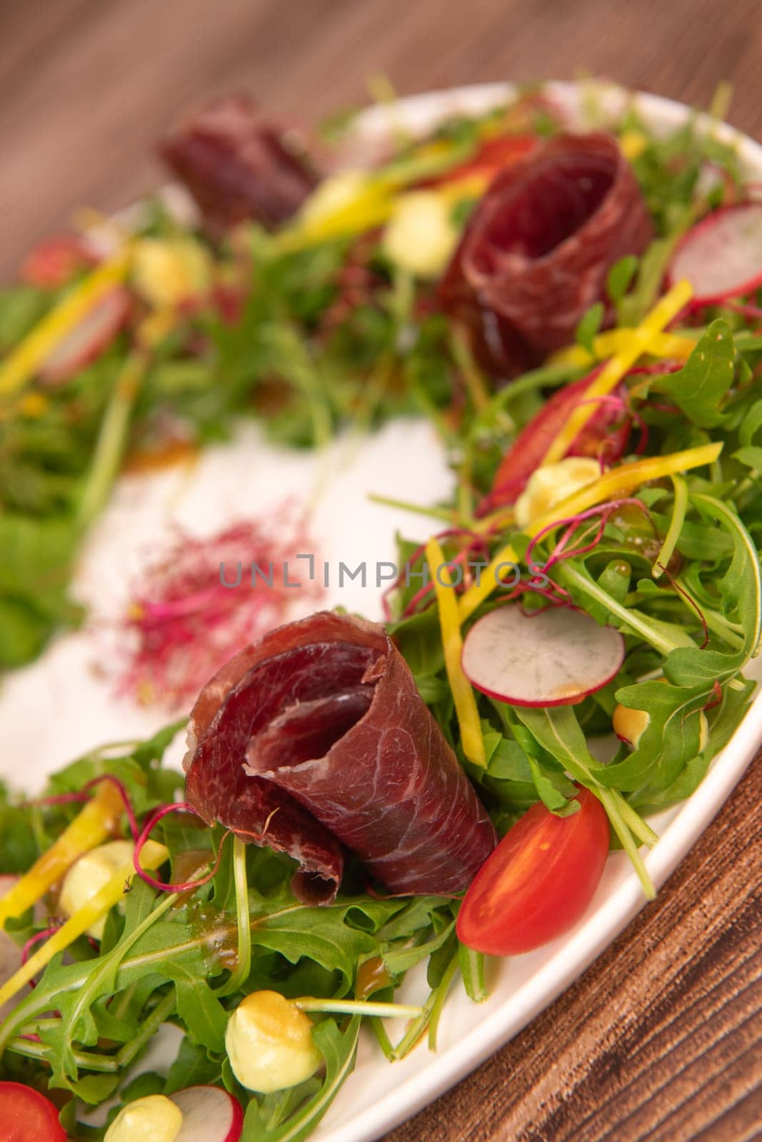 Tasty salad ham with fresh vegetables on wooden background, High quality photo