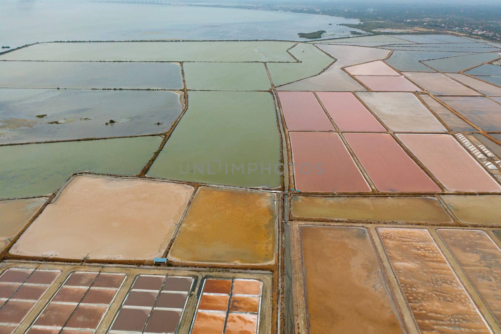Pools with water for evaporation, extraction and production of salt in Sri Lanka.