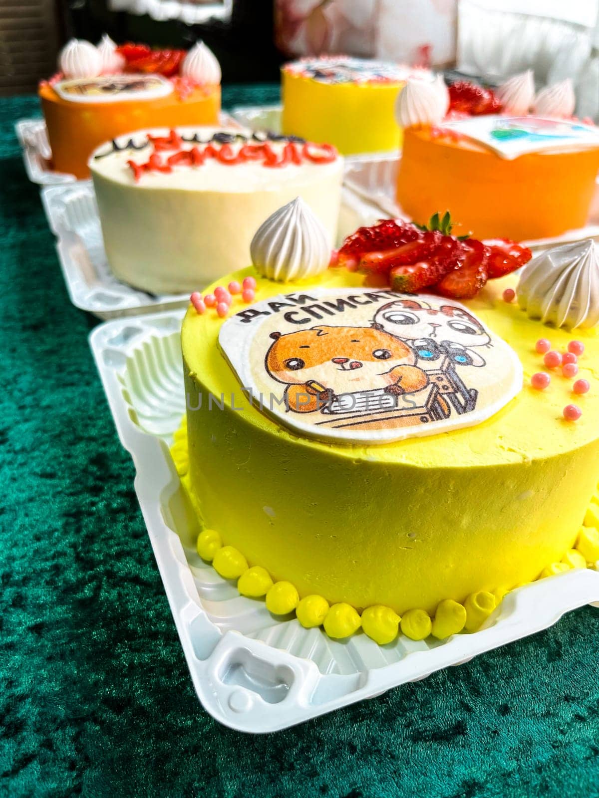 assorted festive bento cakes on the table.