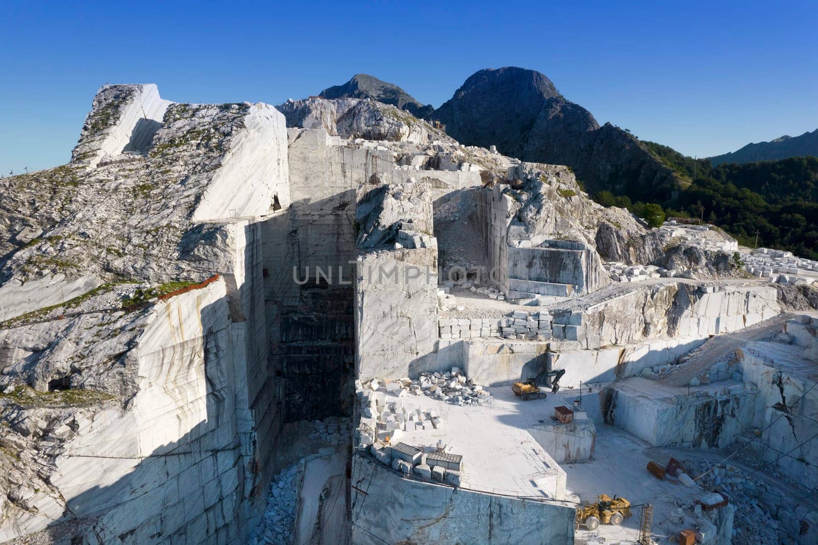 Aerial photographic documentation of a quarry for the extraction of white marble in Carrara Italy 
