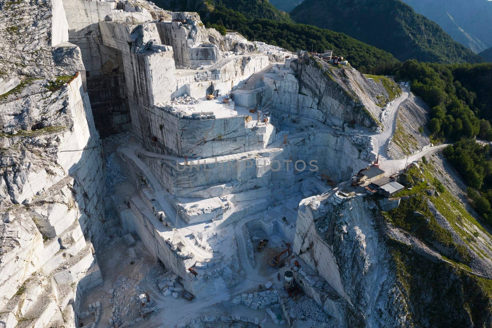 Aerial photographic documentation of a quarry for the extraction of white marble in Carrara Italy 
