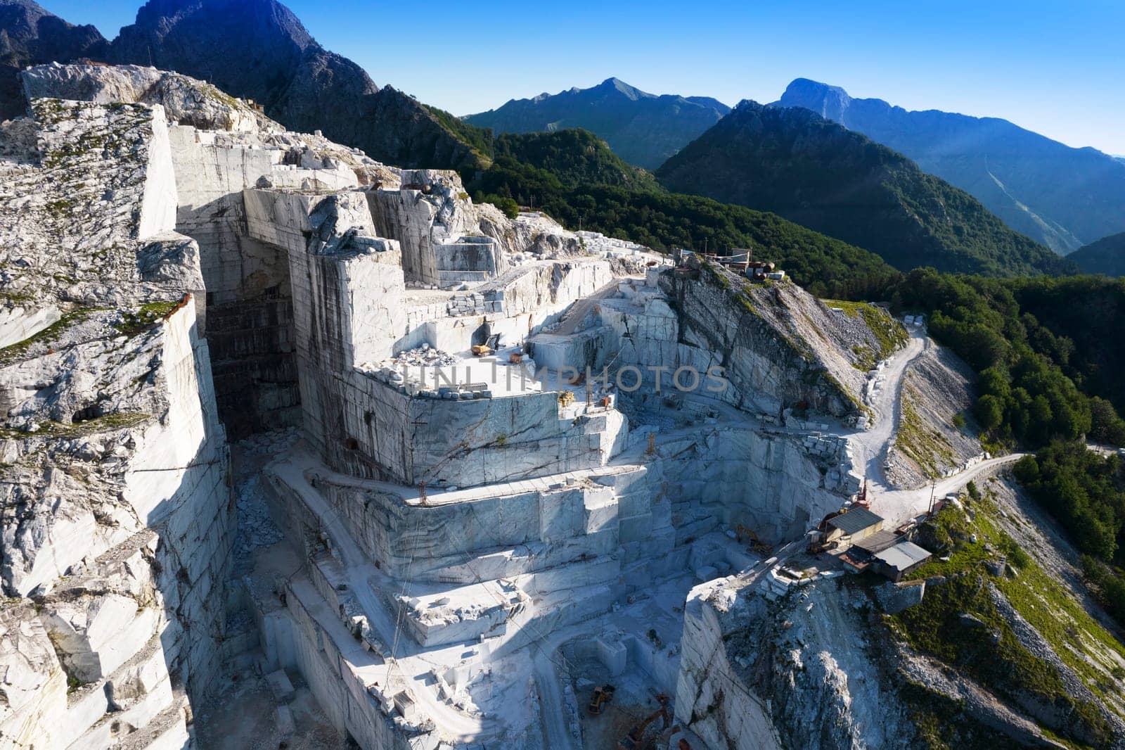 Aerial photographic documentation of a quarry for the extraction of white marble in Carrara Italy 
