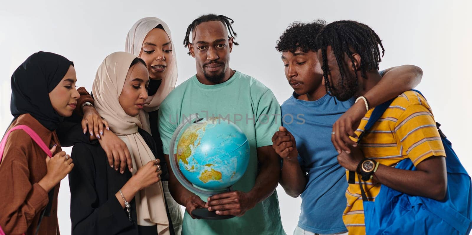 A diverse group of students is gathered around a globe, engrossed in exploration and study, their vibrant energy captured against a pristine white background, symbolizing unity and curiosity in their educational journey by dotshock