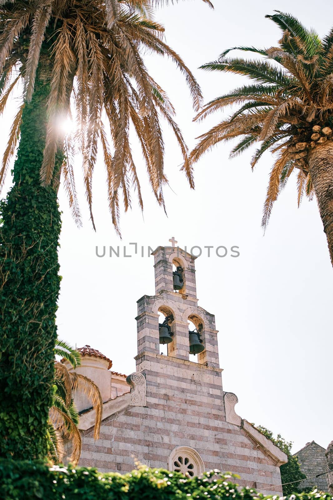 Bell tower on the roof of the Church of the Holy Trinity. Budva, Montenegro. High quality photo