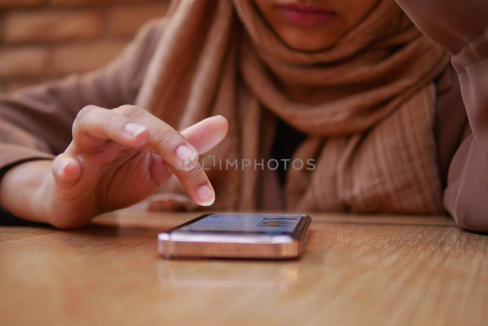 close up of women hand holding smart phone.