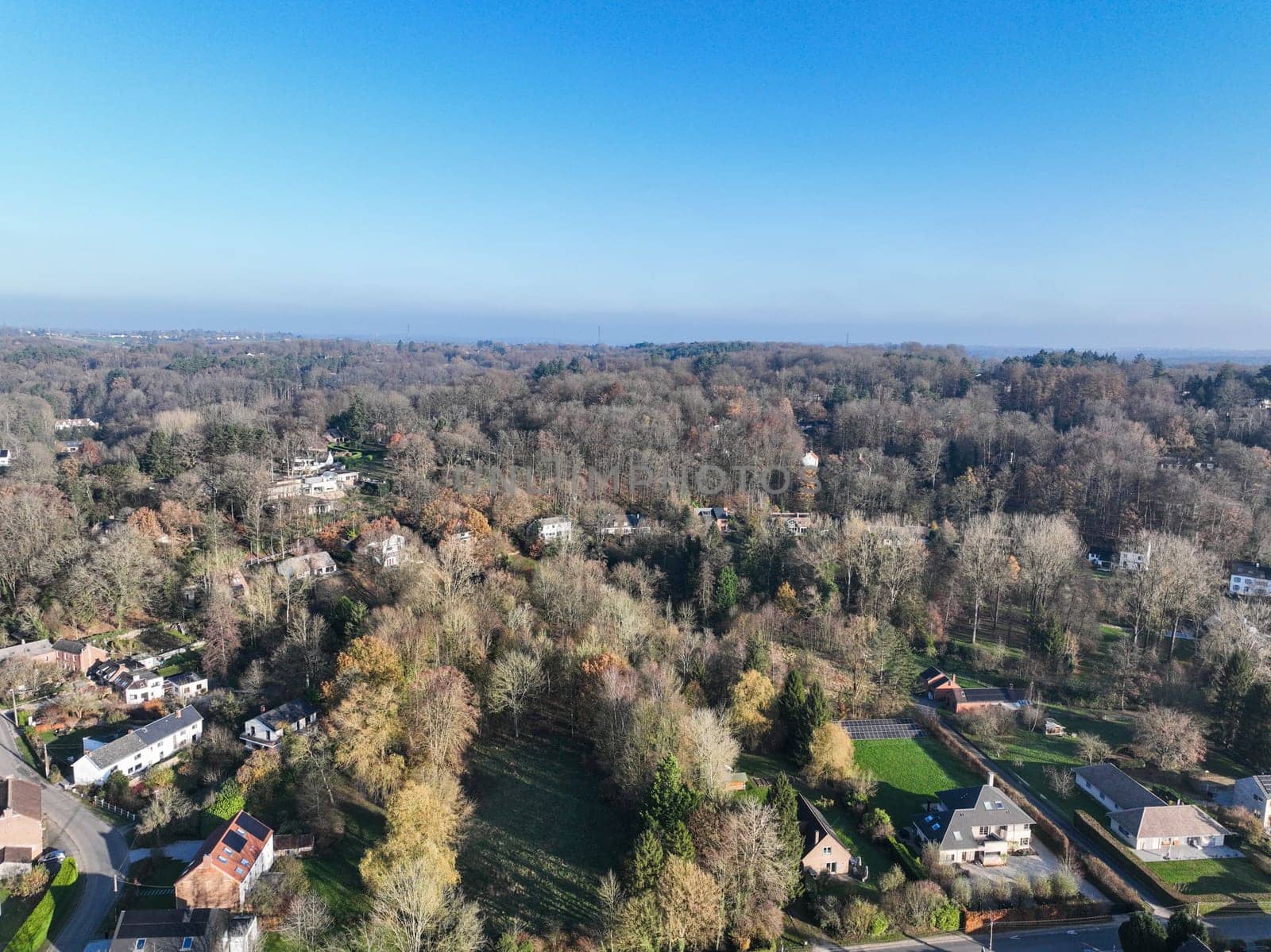 Aerial view of small countryside town in the area of Walloon, Belgium by Bonandbon