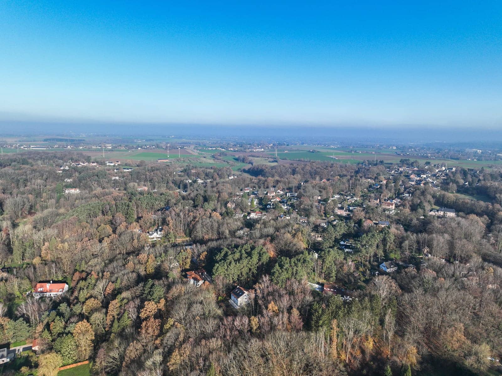 Aerial view of small countryside town in the area of Walloon, Belgium by Bonandbon