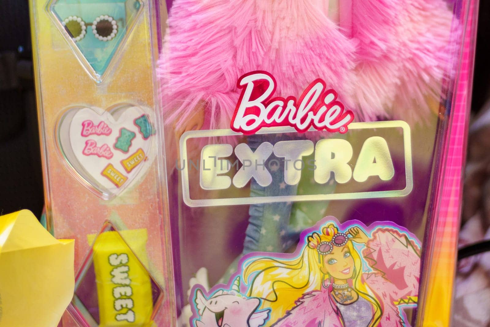 Tyumen, Russia-November 25, 2023: Barbie extra logo, produced by the American toy manufacturing company Mattel, Inc. Selective focus by darksoul72