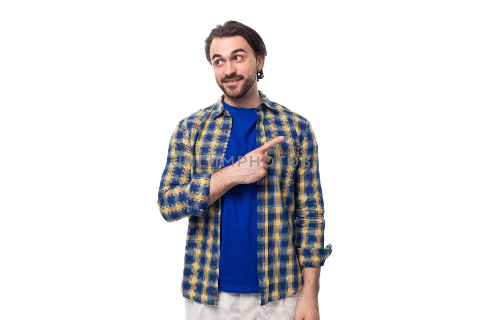 young caucasian brutal man with unshaven face dressed in blue plaid shirt isolated on white background with copy space.