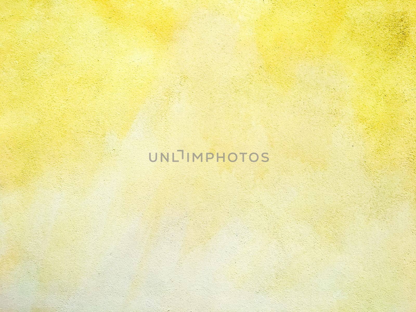 Concrete yellow colorful wall surface texture. Abstract grunge bright illuminating color background. Copyspace.
