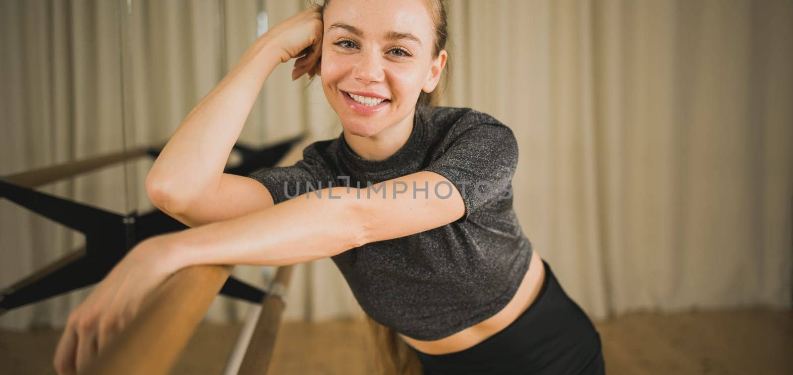 Active young woman portrait female ballet or contemporary dance teacher class